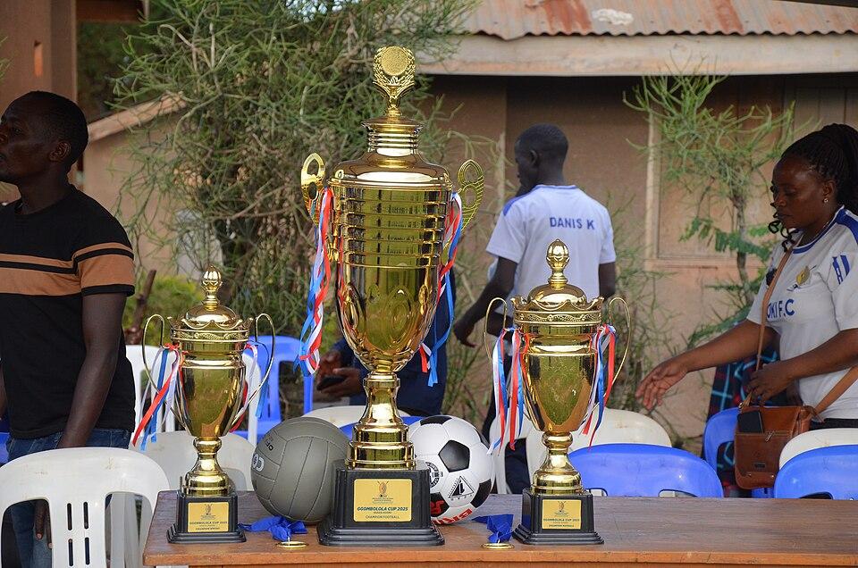 premieri — imagine ilustrativă: Trophies that were awarded at the Kooki Cup tournament in Rakai District.jpg